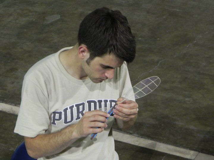 Sanborn examining his device