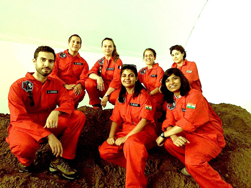 Jennifer Pouplin with the Poland Mars Analogue Simulation crew. (Pouplin is third from the right, top.)