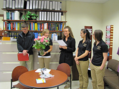 Hendryx with her award and flowers