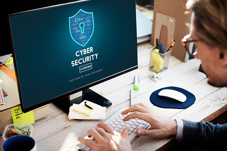 hacker sitting at computer