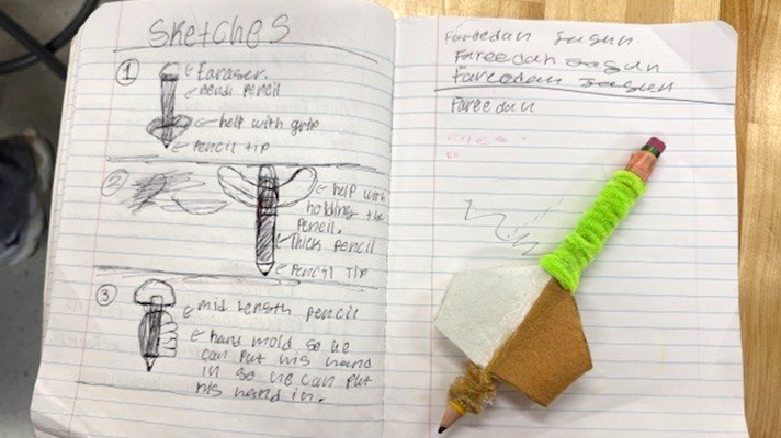 stetches and phototype of the adaptive pencil on a notebook