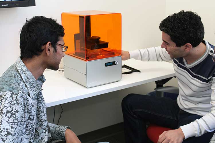 Prof. Martinez explains 3D printer use