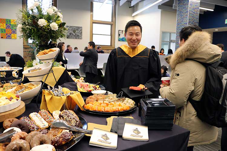 Master's graduate Jinwon Park is all smiles