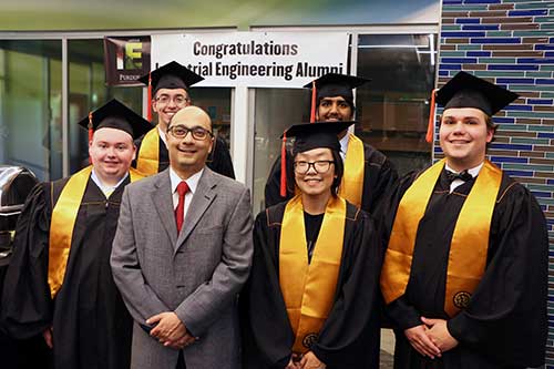 School Head Abhi Deshmukh with a few of the IE grads