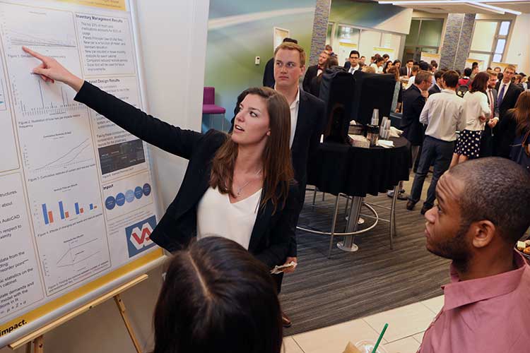 Photo of Megan Nowak of Team VA Pharmacy presenting