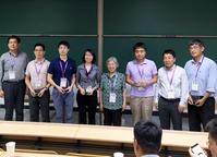 Photo of Hua Cai receiving CSIE 2018 Best Paper Award 