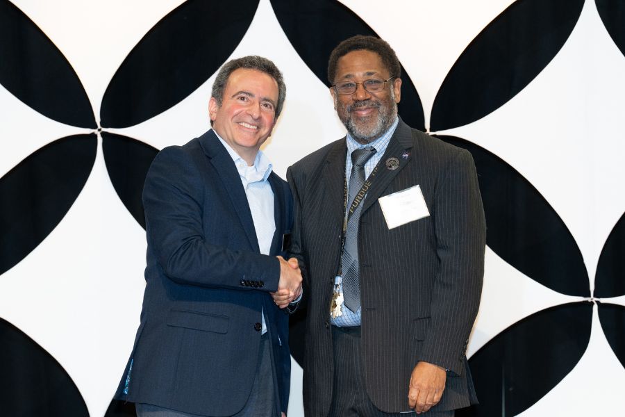 George Youssef (Far Right) receiving award at a Purdue Football home game.