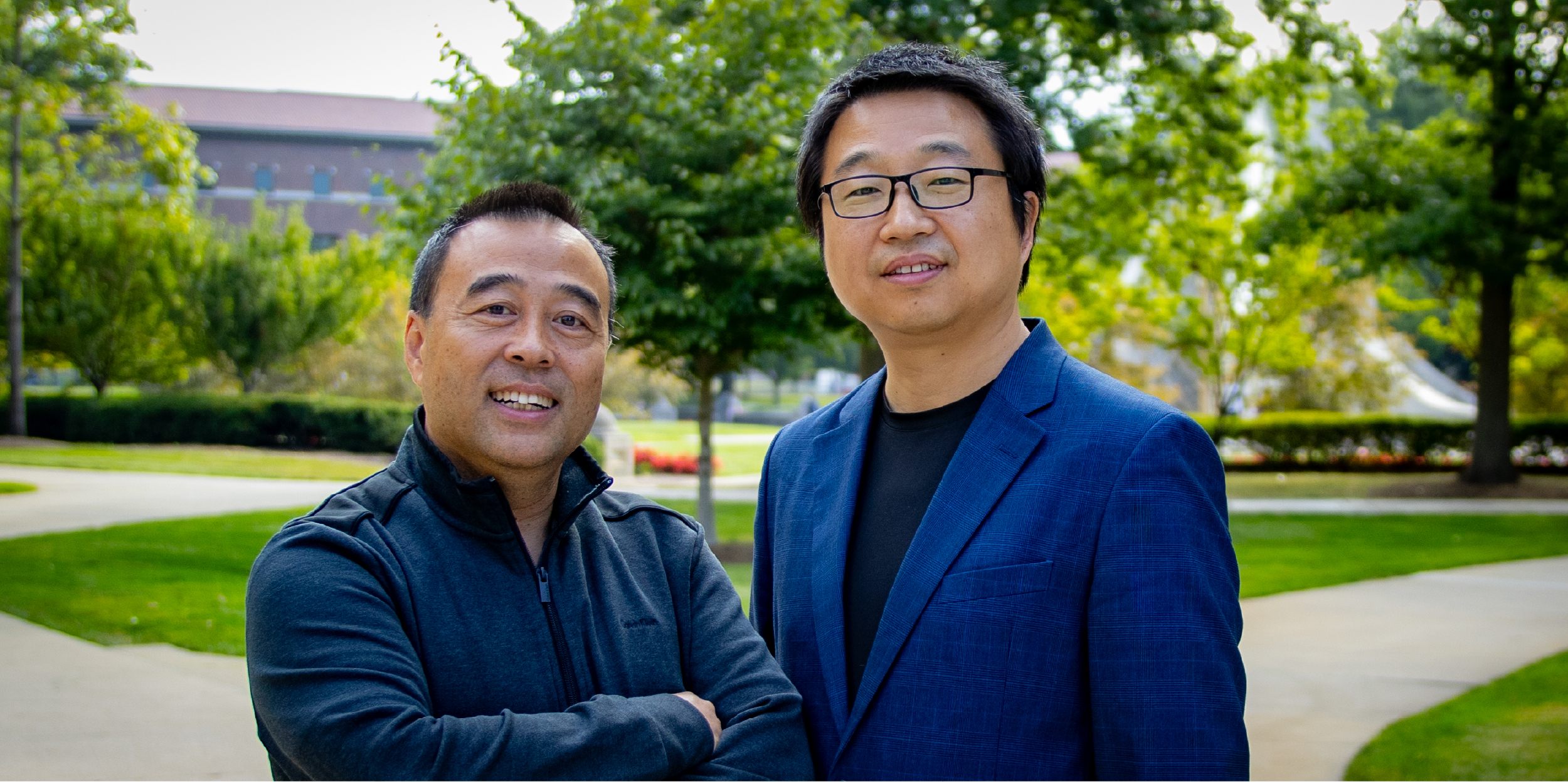 Guang Lin and Wenzhuo Wu stand together on the Purdue Campus