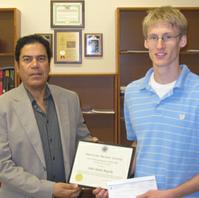 Ahmed Hassanein, Paul L. Wattelet Professor and Head of Nuclear Engineering with John Boguskii
