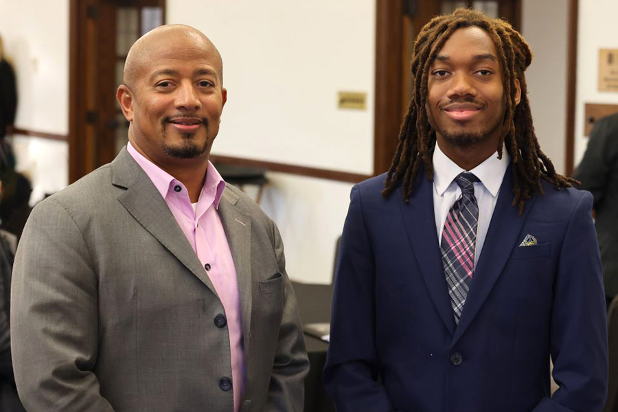 Travis Langster and Xavier WIlliams standing next to each other